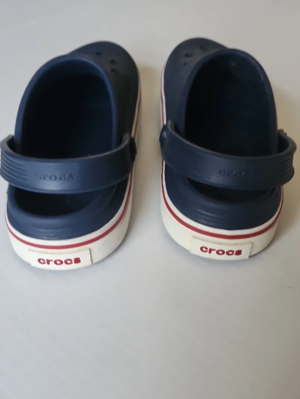 CROCS Kids Navy Clogs with Red and White Trim